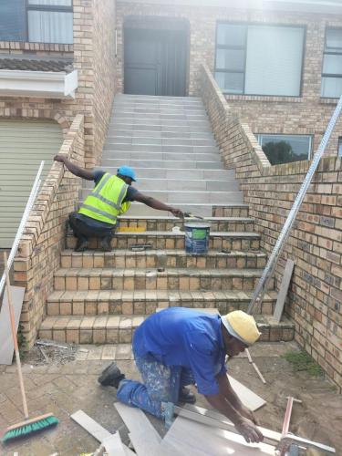 working on tiling stairs